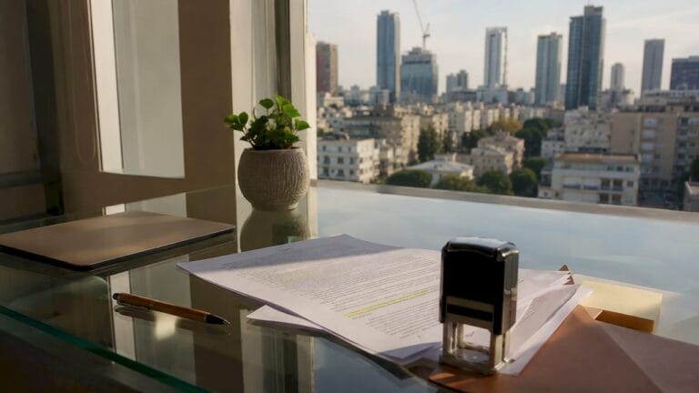 Legal professional reviewing documents in office