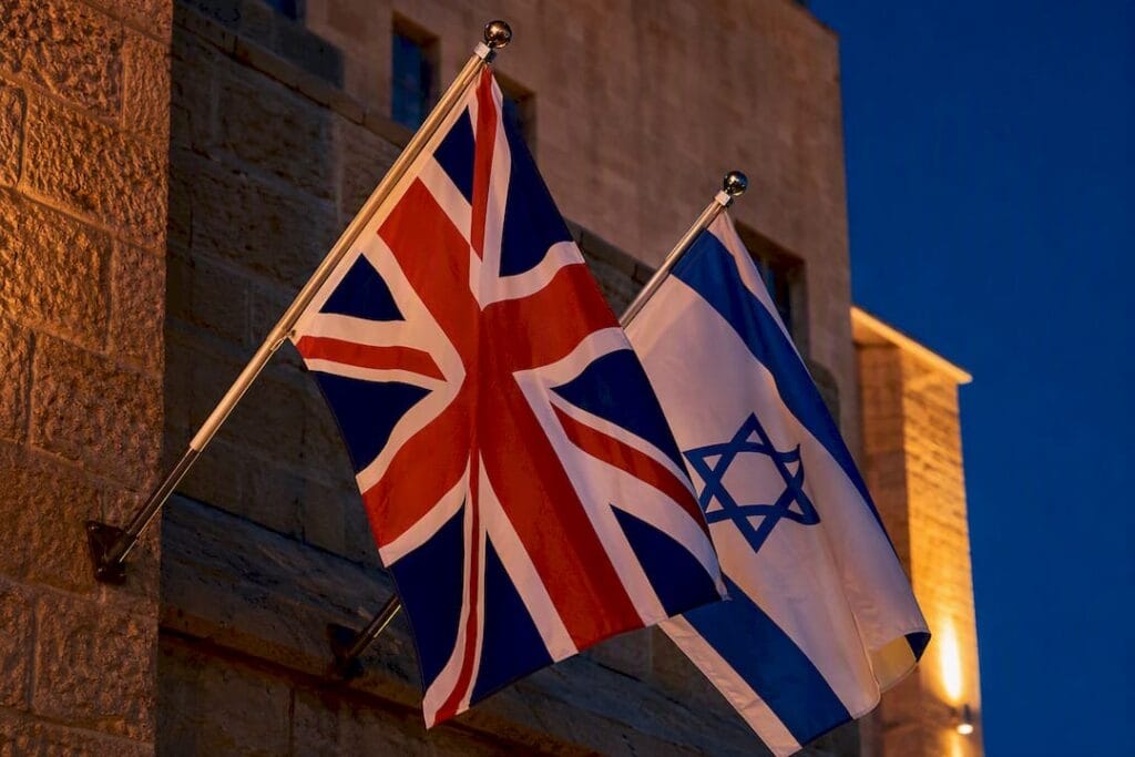 Israeli and UK flags outside Jerusalem building