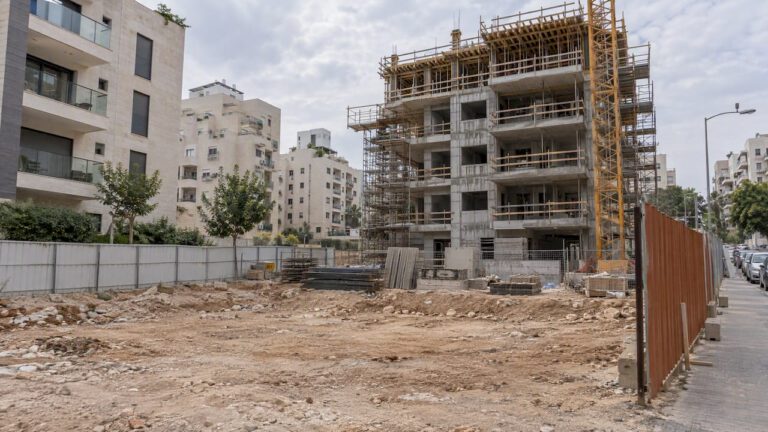 Israeli apartment buildings beside a construction site